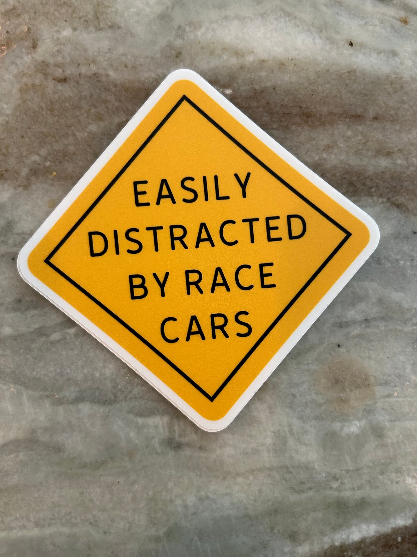 Easily Distracted By Racecars Sticker
